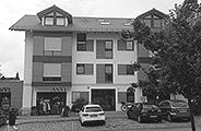 Baumann Architekten: Neubau Wohn- und Geschäftshaus in Deisenhofen